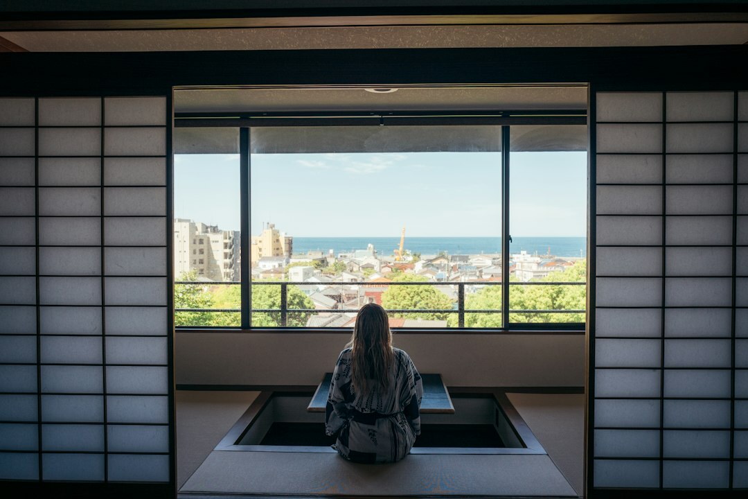 person meditating in quiet room