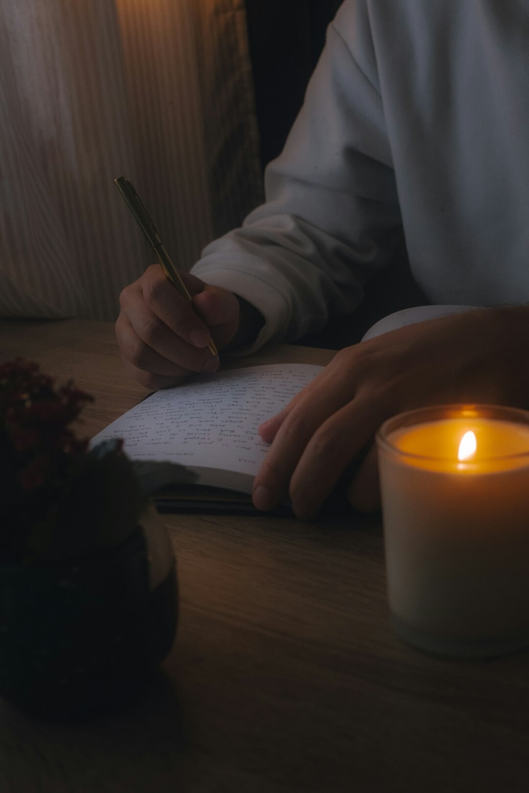 person journaling thoughts